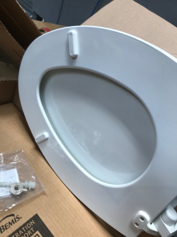 Photo 2 of 2 of- white toilet seats 