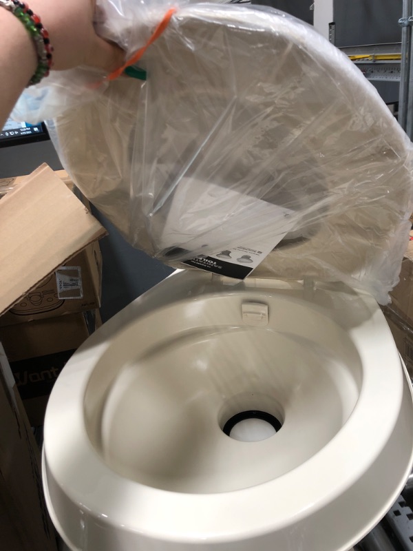 Photo 4 of Dometic 300 Series Standard Height Toilet, Bone Standard Height Bone