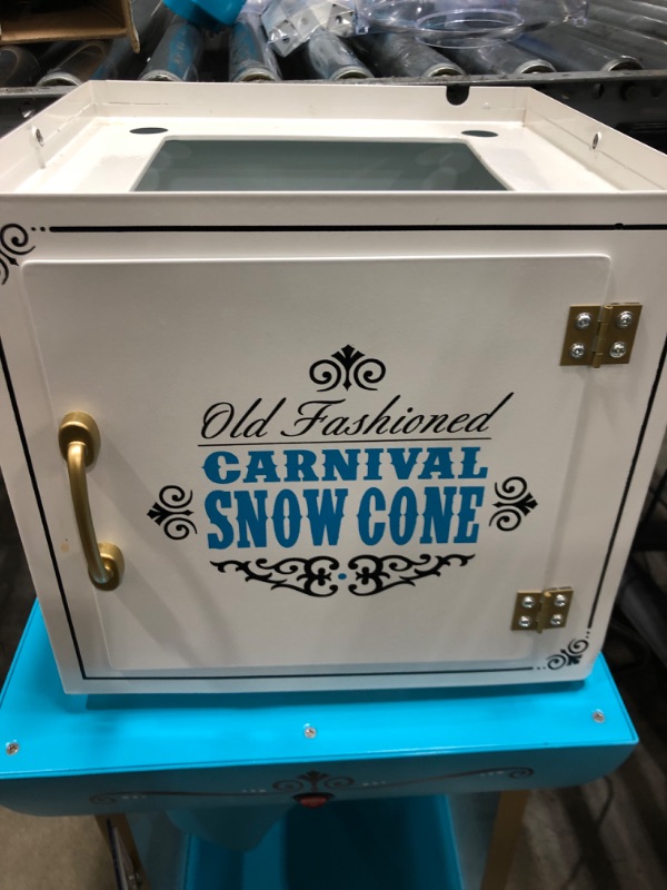 Photo 5 of ***PARTS ONLY*** Nostalgia Snow Cone Cart, 48-Inch, Makes 48 ICY Treats, Vintage Snow Machine Includes Metal Scoop, Storage Compartment, Wheels for Easy Mobility, White/Blue
