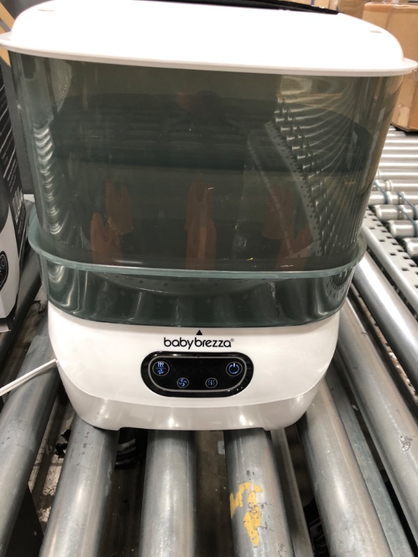 Photo 1 of Baby Brezza Baby Bottle Sterilizer and Dryer Advanced – Electric Steam Sterilization Machine – Universal Sterilizing for All Bottles: Plastic + Glass + Pacifiers + Breast Pump Parts - HEPA Filtration
