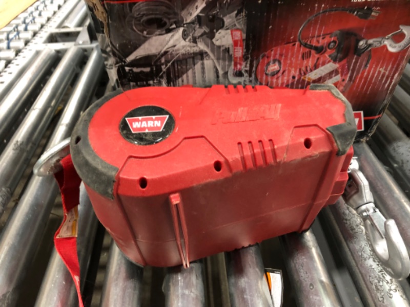 Photo 2 of ***NON-FUNCTIONAL***  ****WARN 885000 PullzAll Corded 120V AC Portable Electric Winch with Steel Cable: 1/2 Ton (1,000 Lb) Pulling Capacity , Red