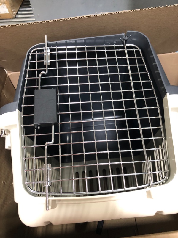 Photo 3 of  ***No food bowls included.***
  Designs Plastic Kennels Rolling Plastic Wire Door Travel Dog Crate - Small - No Wheel, Tan