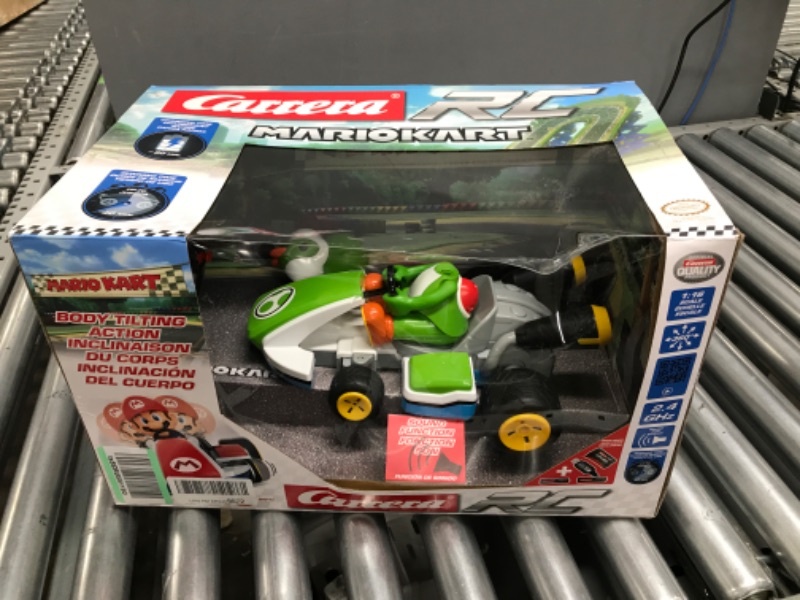 Photo 2 of Carrera RC 370162108X Official Licensed Mario Kart Yoshi Race Kart 1:16 Scale 2.4 GHz Splash Proof Remote Control Car Vehicle with Sound and Body Tilting Action - Rechargeable Battery - Kid Toys
