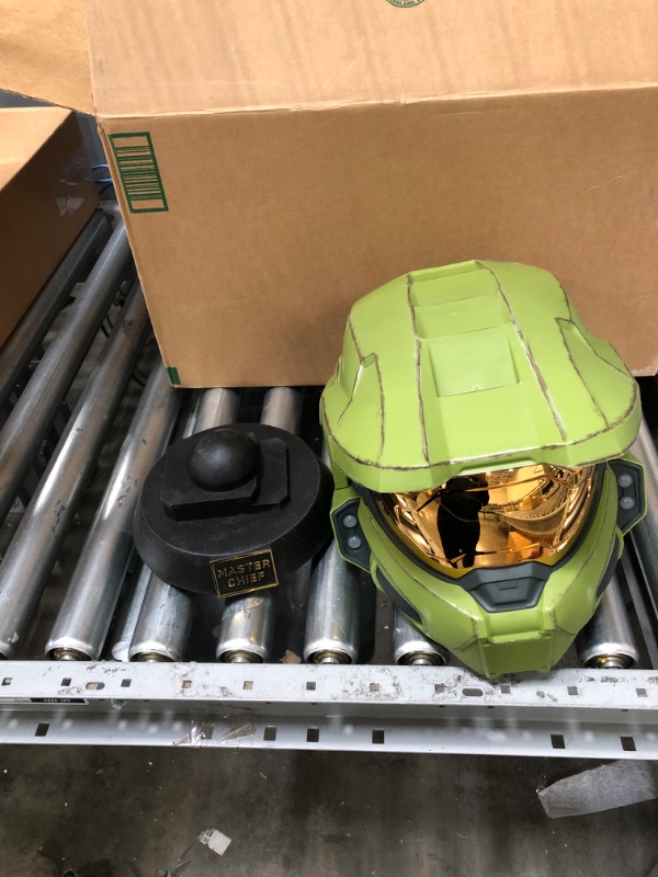 Photo 2 of HALO Master Chief Deluxe Helmet with Stand - LED Lights on Each Side - Battle Damaged Paint - One Size Fits Most - Build Your Halo Universe, Green