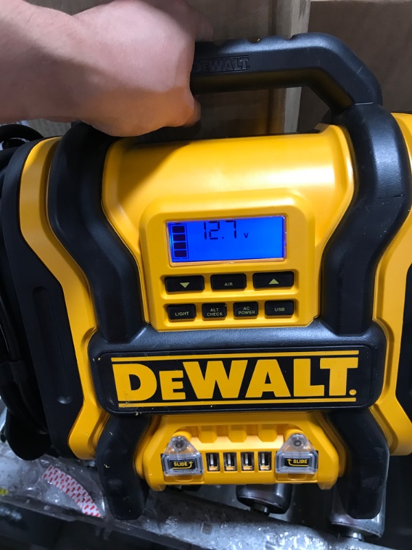 Photo 1 of DEWALT DXAEPS14 1600 Peak Battery Amp 12V Automotive Jump Starter/Power Station with 500 Watt AC Power Inverter, 120 PSI Digital Compressor, and USB Power , Yellow