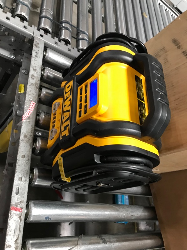 Photo 1 of DEWALT DXAEPS14 1600 Peak Battery Amp 12V Automotive Jump Starter/Power Station with 500 Watt AC Power Inverter, 120 PSI Digital Compressor, and USB Power , Yellow