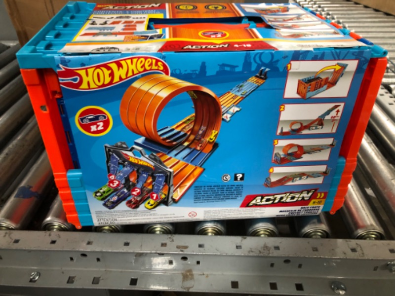 Photo 2 of ?€?Hot Wheels Race Crate with 3 Stunts in 1 Set Portable Storage Ages 6 to 10 [Amazon Exclusive] & Set Of 10 1:64 Scale Toy Trucks And Cars For Kids And Collectors (Styles May Vary) [Amazon Exclusive] Race Tracks + Hot Wheels Set Of 10
