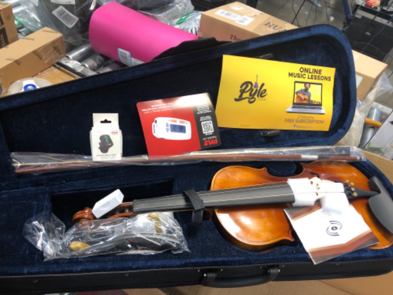Photo 1 of Pyle Full Size Beginner Violin Starter Kit, Violin Starter Package with Travel Case & Bow, Extra Strings, Digital Tuner, Shoulder Rest & Cleaning Cloth for Students, Kids, Adults Standard 4/4