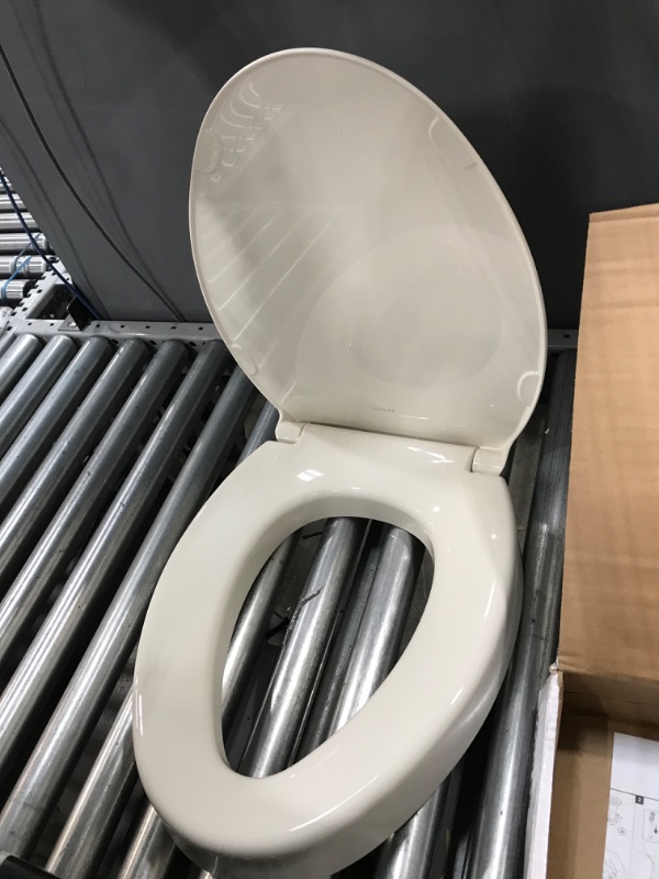 Photo 2 of **item is not used but was opened**
Hyten Elevated Quiet-Close Elongated Toilet Seat, Biscuit Elongated Elongated Biscuit