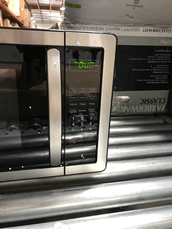 Photo 3 of **item has been used**
Farberware Countertop Microwave 1.1 Cu. Ft. 1000-Watt Compact Microwave 