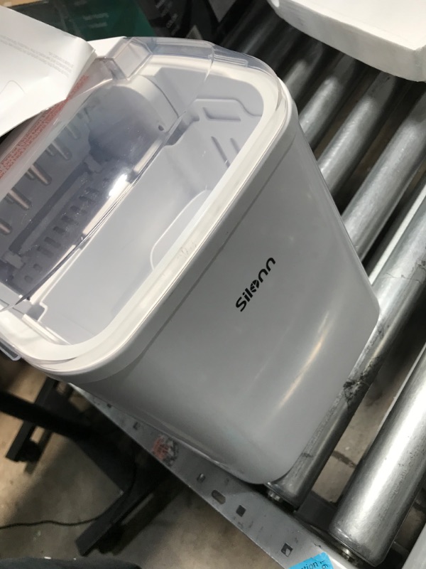 Photo 4 of **ITEM DOES NOT TURN ON, PARTS ONLY**
Silonn Countertop Ice Maker Machine with Handle-NOT FUNCTIONAL**