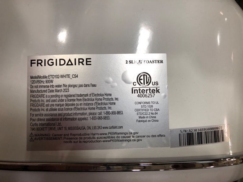 Photo 4 of ***POWERS ON*** Frigidaire ETO102-WHITE, 2 Slice Toaster, Retro Style, Wide Slot for Bread, English Muffins, Croissants, and Bagels, 5 Adjustable Toast Settings, Cancel and Defrost, 900w, White WHITE Toaster