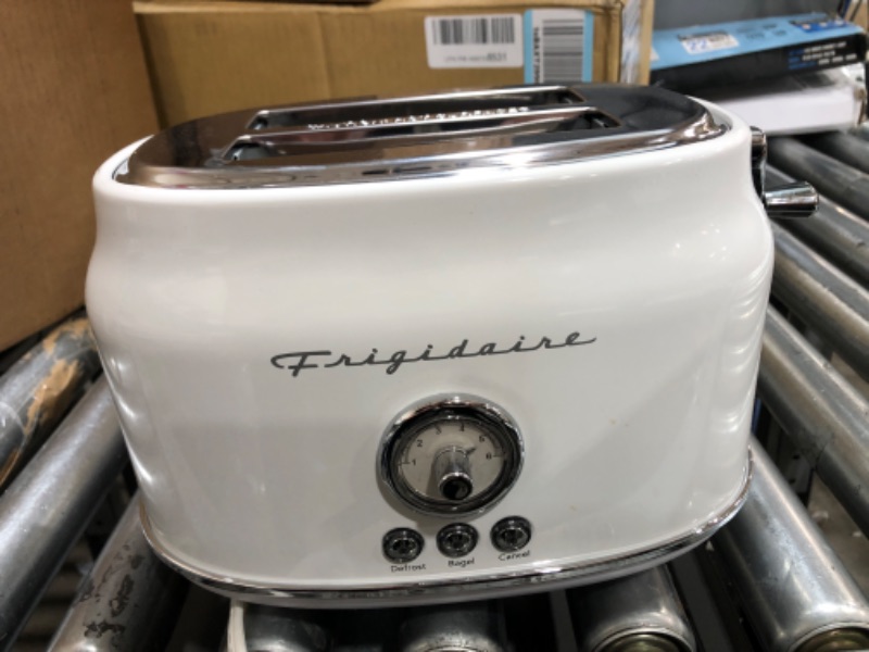 Photo 3 of ***POWERS ON*** Frigidaire ETO102-WHITE, 2 Slice Toaster, Retro Style, Wide Slot for Bread, English Muffins, Croissants, and Bagels, 5 Adjustable Toast Settings, Cancel and Defrost, 900w, White WHITE Toaster