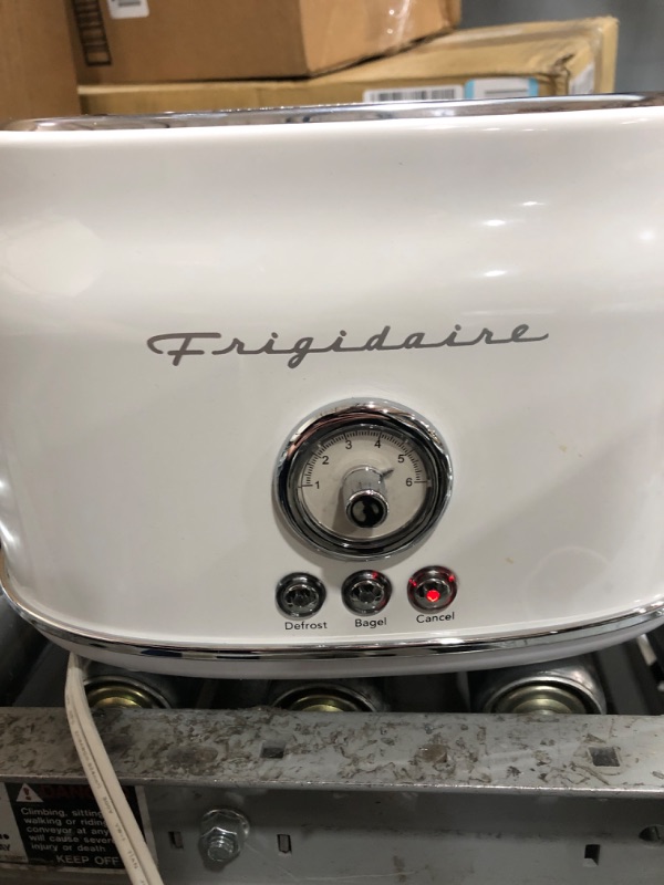 Photo 2 of ***POWERS ON*** Frigidaire ETO102-WHITE, 2 Slice Toaster, Retro Style, Wide Slot for Bread, English Muffins, Croissants, and Bagels, 5 Adjustable Toast Settings, Cancel and Defrost, 900w, White WHITE Toaster