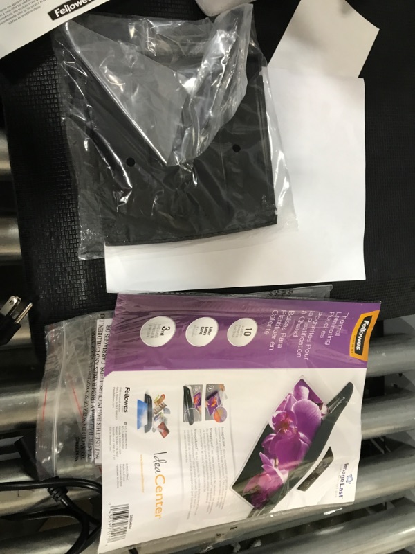 Photo 1 of Fellowes Laminator Venus 2 125, Rapid 30-60 Second Warm-up Laminating Machine, with Laminating Pouches Kit (5734801), Black, Silver, 5.1" x 21.3" x 8.2" & 52042 Glossy Pouches - Letter 10 mil 50 Pack Venus Laminator + Laminating Pouches, 50 Pack