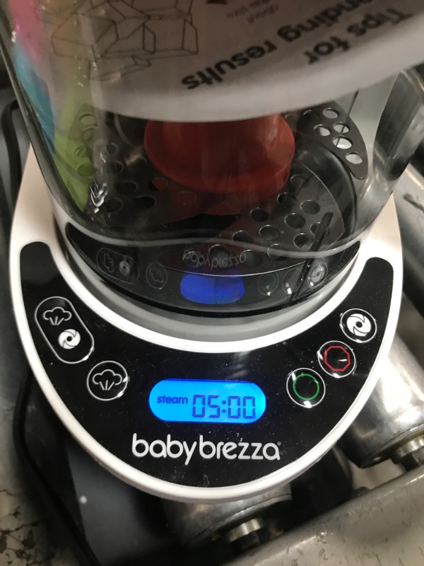 Photo 2 of Baby Brezza One Step Baby Food Maker Deluxe – Cooker and Blender in One to Steam and Puree Baby Food for Pouches - Make Organic Food for Infants and Toddlers - Set Includes 3 Pouches and 3 Funnels