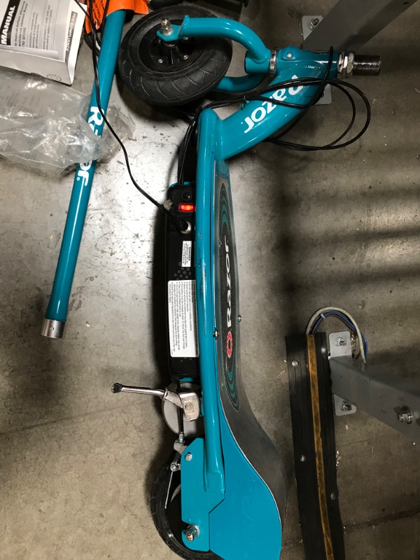 Photo 1 of 
Razor E200 Electric Scooter - 8" Air-Filled Tires, 200-Watt Motor, Up to 12 mph and 40 min of Ride Time
Style:Standing Ride (E200)
Pattern Name:Scooter
Color:Teal