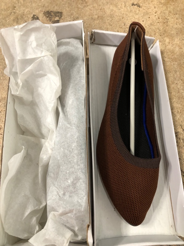 Photo 1 of brown clothed flats size 6