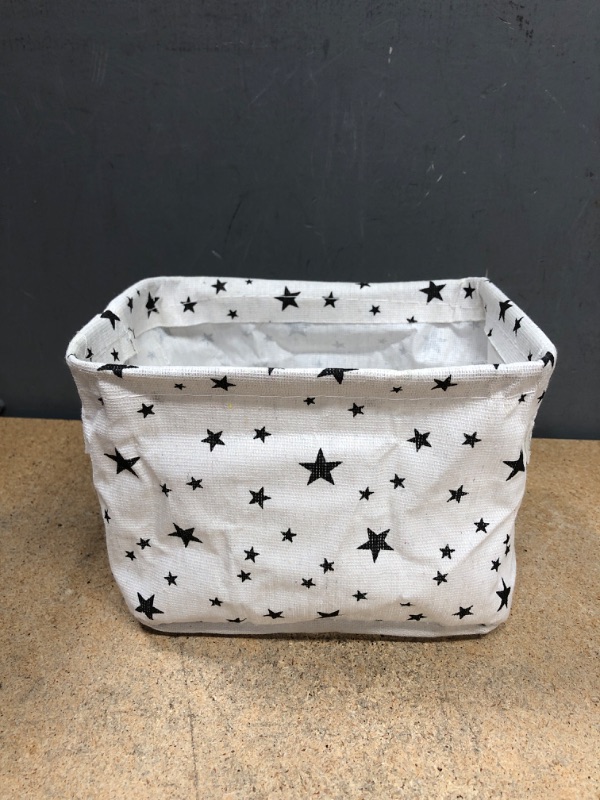 Photo 1 of 4 Pack Small Storage Baskets, White & Black with Pine Tree, Star, Cross, & Dot design. 