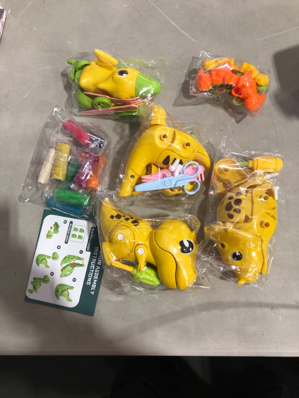 Photo 1 of Dinosaur Play Dough Sets for Toddlers, Playdough Toys Tool Kit with 12 Pack Dough Yellow