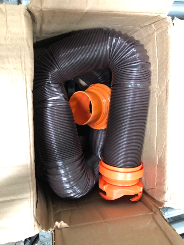 Photo 2 of Camco RhinoFLEX RV Sewer Hose Kit with Swivel Transparent Elbow and 4-in-1 Dump Station Fitting, Brown, 15 Feet (39770) 15ft Sewer Hose Kit Frustration-Free Packaging