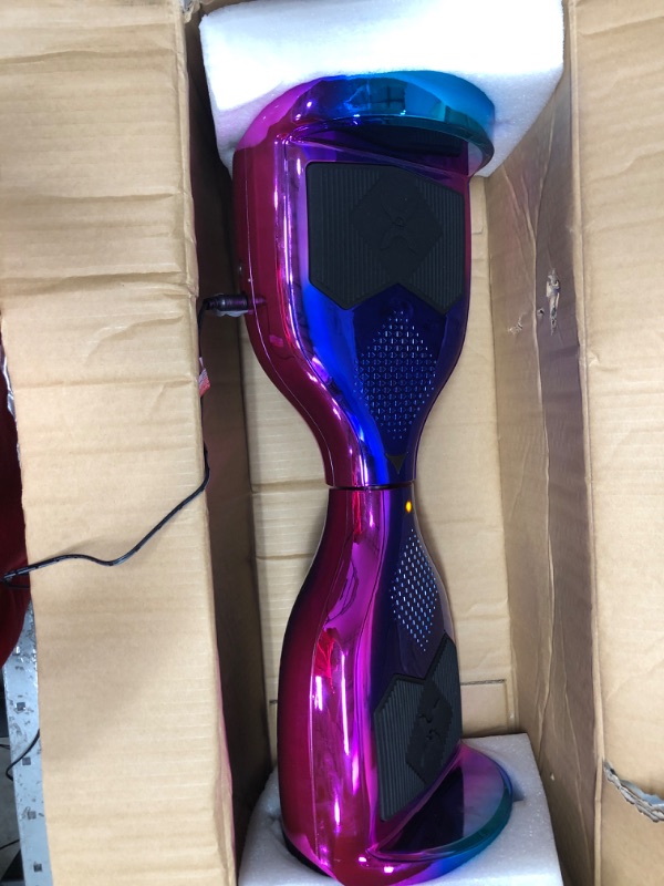 Photo 2 of **PARTS ONLY**
Hover-1 Helix Electric Hoverboard | 7MPH Top Speed, 4 Mile Range, 6HR Full-Charge, Built-in Bluetooth Speaker, Rider Modes: Beginner to Expert Hoverboard Iridescent