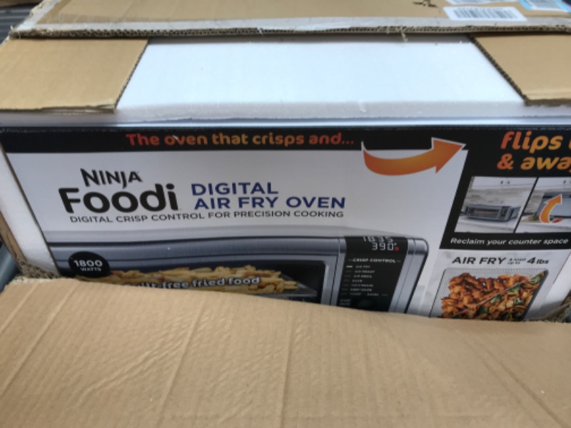 Photo 2 of Ninja SP101 Digital Air Fry Countertop Oven with 8-in-1 Functionality, Flip Up & Away Capability for Storage Space, with Air Fry Basket, Wire Rack & Crumb Tray, Silver