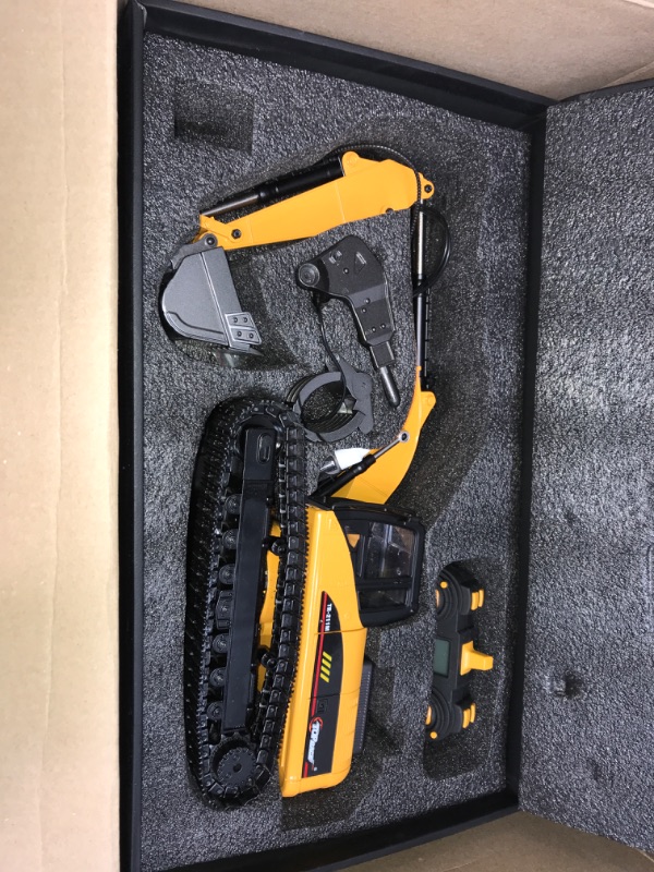 Photo 1 of Top Race 15 Channel Full Functional Remote Control Excavator Construction Tractor - Remote Excavator Toy with 2.4Ghz Transmitter and Metal Shovel - Remote Controlled Excavator Mini Excavator