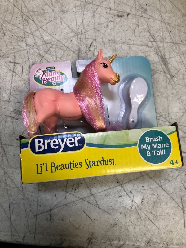 Photo 2 of Breyer Horses Mane Beauty Li'l Beauties | Stardust - Unicorn | Brushable Pink and Gold Mane and Tail | 4.25" L x 3.25" H | Model #7414 4 Inch Pink
