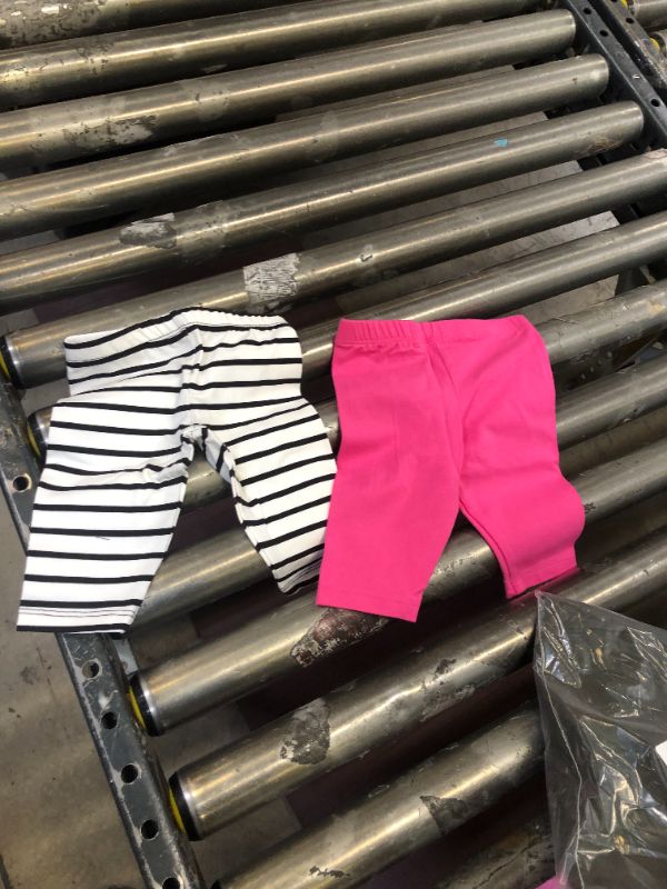 Photo 1 of Baby Pants - Black-white Stripped and Pink 12-18 Months 