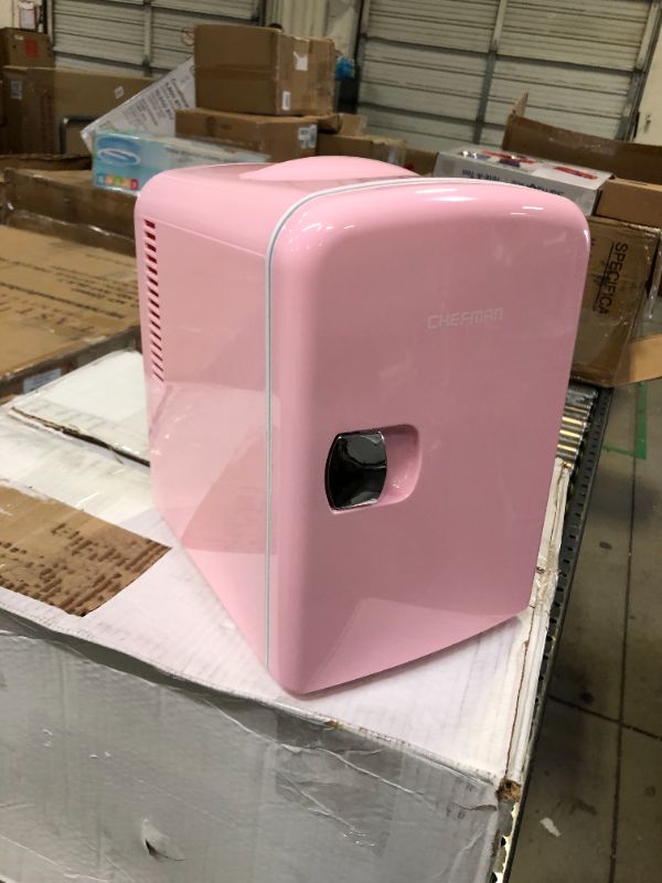Photo 2 of Chefman Mini Portable Pink Personal Fridge Cools Or Heats & Provides Compact Storage For Skincare, Snacks, Or 6 12oz Cans W/ A Lightweight 4-liter Capacity To Take On The Go