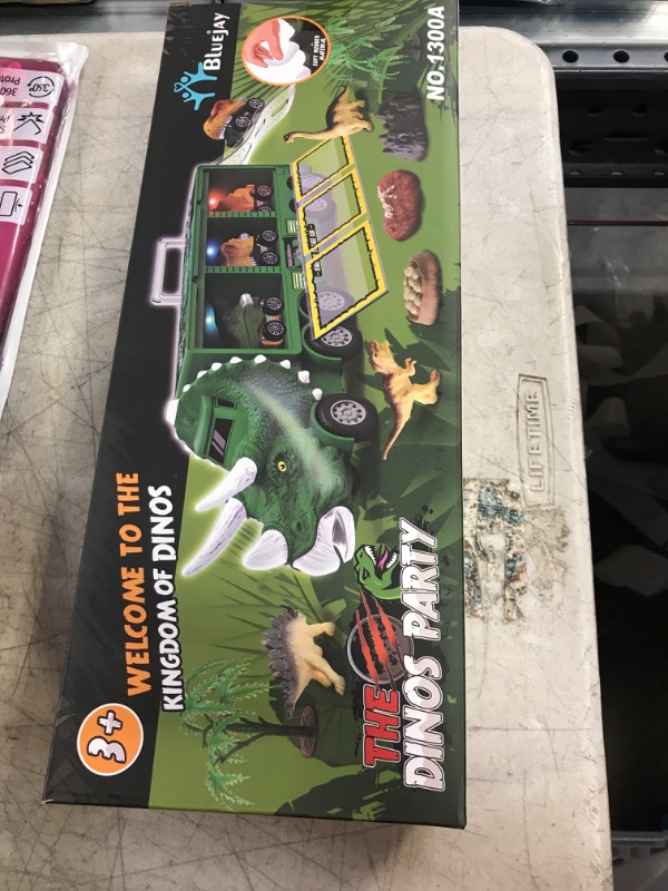 Photo 2 of BLUEJAY 21 Pack Dinosaur Toys for Kids 3-7, Dinosaur Truck with Oversized Dinosaur Map, Flashing Lights, Music and Roaring Sound, Kids Toys with 6 Pull Back Dinosaur Cars, 6 Dinosaur Toys (Green)