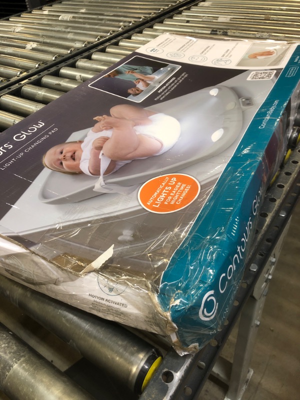 Photo 1 of Contours Glow Motion Sensing Light-Up Changing Pad for Dresser or Changing Table, Motion Activated Soft Glow Lights, Three Brightness Settings, Easy to Clean, Comfortable and Waterproof