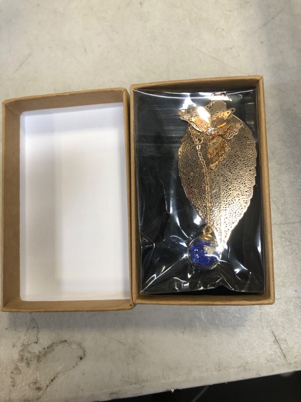 Photo 1 of Toirxarn Metal Leaf Bookmarks with 3D Butterfly Pendant - Perfect Teacher Appreciation, and Birthday Gift for Women, Her, Mom, Librarian, and Book Lovers - Unique Page Marker Golden Leaf Bookmark Blue Ball White Flower