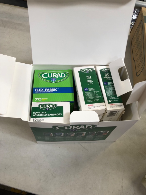 Photo 2 of Curad Assorted Bandages Variety Pack 300 Pieces, Including Antibacterial, Heavy Duty, Fabric, and Waterproof Bandages