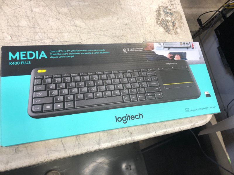 Photo 2 of Logitech K400 Plus Wireless Touch With Easy Media Control and Built-in Touchpad, HTPC Keyboard for PC-connected TV, Windows, Android, Chrome OS, Laptop, Tablet - Black PLUS Floral