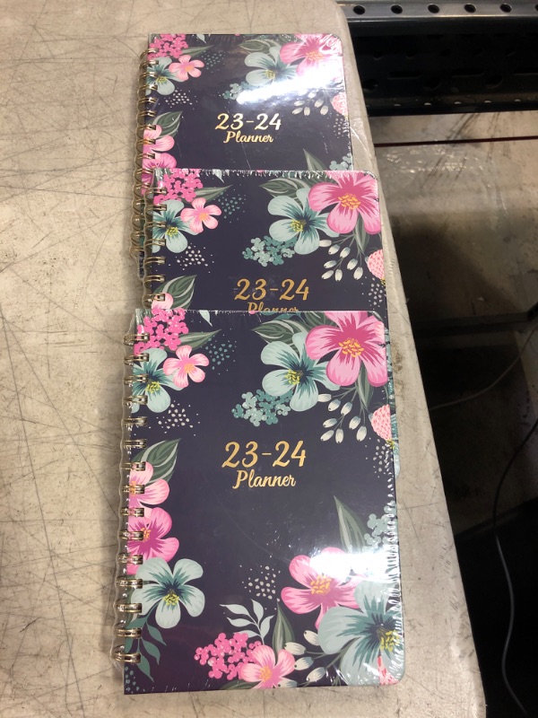 Photo 2 of Planner 2023-2024 - Academic Planner 2023-2024, Jul. 2023 - Jun. 2024, Weekly & Monthly Planner with Tabs, 6.4" x 8.5", Hardcover with Back Pocket + Thick Paper + Twin-Wire Binding - Navy Floral
pack of 3 
