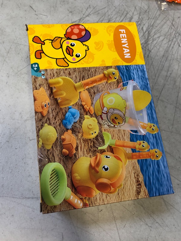 Photo 1 of FENYAN Beach Toys for Kids, 22Pcs Toddler Sand Toys Includes Beach Bucket, Sand Castle Kit, Duck-Shape Watering Can, Sand Spade, Shovel, Rake, Sieve, Dinosaur Sand Molds for Preschool Boys Girls
