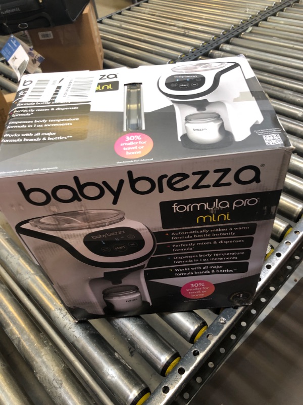 Photo 2 of Baby Brezza Formula Pro Mini Baby Formula Maker – Small Baby Formula Mixer Machine Fits Small Spaces and is Portable for Travel– Bottle Makers Makes The Perfect Bottle for Your Infant On The Go Formula Pro Mini Dispenser Machine