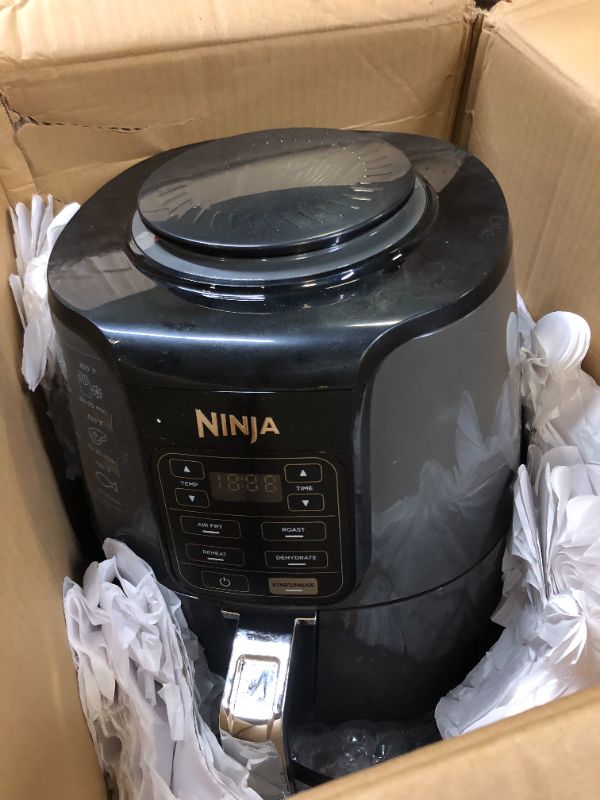 Photo 2 of Ninja AF101 Air Fryer that Crisps, Roasts, Reheats, & Dehydrates, for Quick, Easy Meals, 4 Quart Capacity, & High Gloss Finish, Grey
