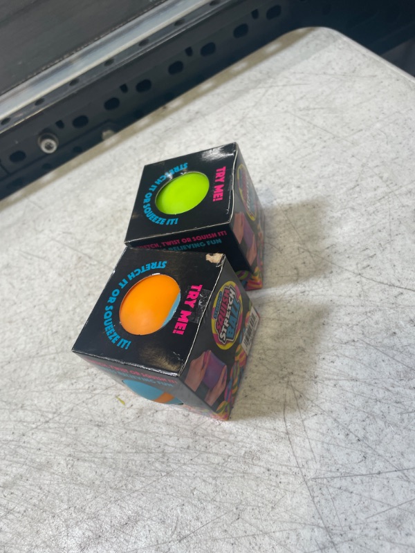 Photo 1 of 2 -- The Toy Network Striped Squish and Stretch Ball