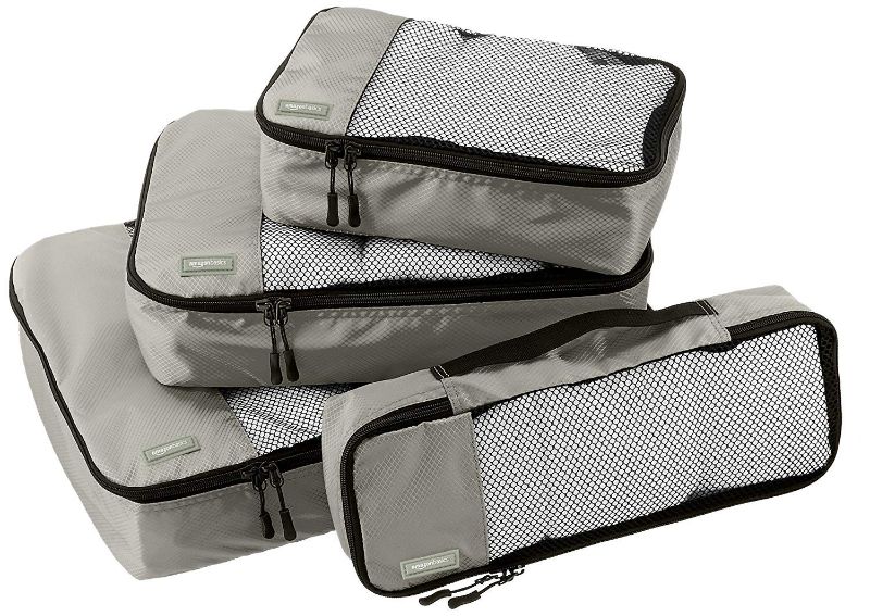 Photo 1 of Amazon Basics 4 Piece Packing Travel Organizer Cubes Set, Small, Medium, Large, and Slim, Gray Gray Small, Medium, Large, and Slim