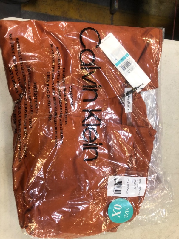 Photo 1 of burnt orange calvin klein shirt size 0x