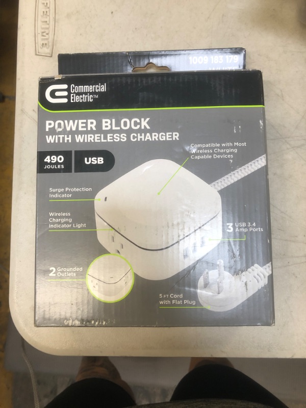 Photo 1 of Commercial Electric 2-Outlet 3 USB-a Surge Protector with Qi Charge, White
factory sealed 