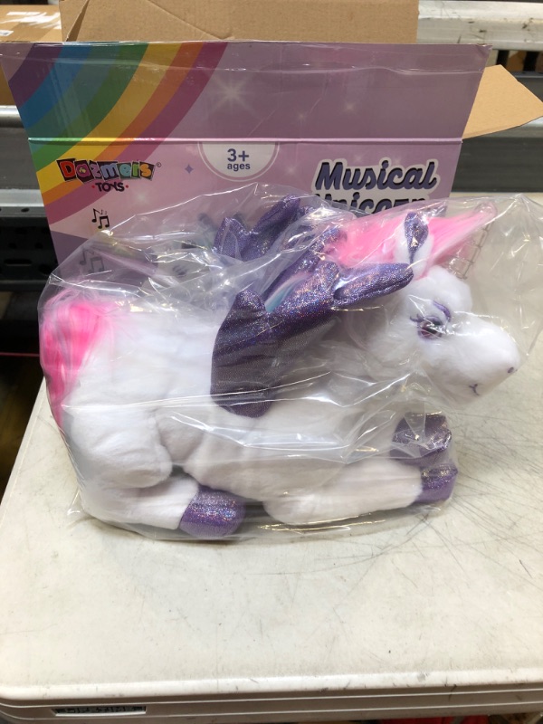 Photo 2 of Dazmers Unicorn Light Up Stuffed Animal Toy with Flapping Wings - Musical Unicorn Plushies for Girls and Boys with Magical Lights and Sounds (Purple)