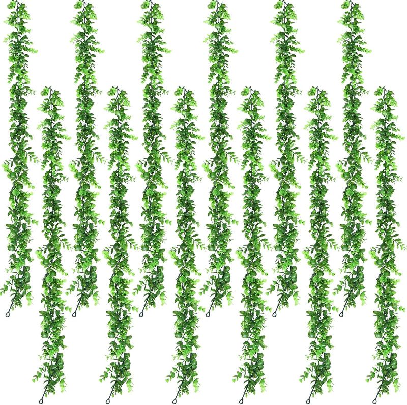 Photo 1 of 12 Pack Artificial Vines Faux Eucalyptus Garland Plant Hanging Greenery Garland Green Wedding Backdrop Arch Wall Decor 6 Feet/pcs Fake Hanging Plant for Baby Shower Festival Party Table Decoration
