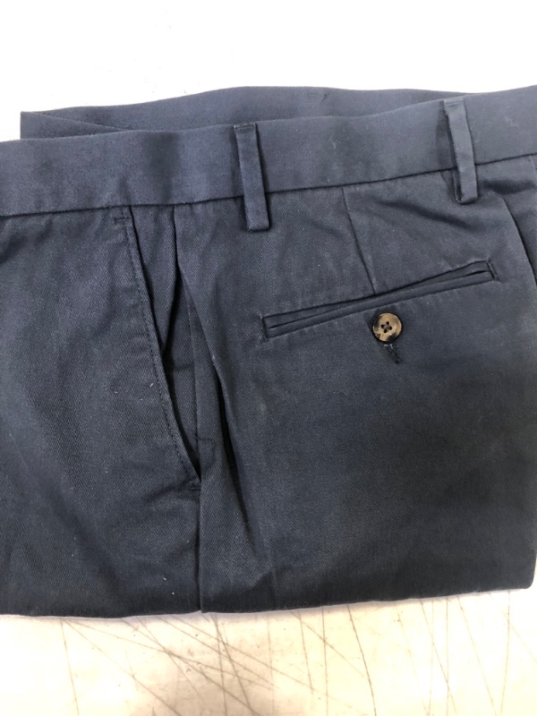 Photo 2 of Amazon Essentials Men's Classic-Fit Wrinkle-Resistant Pleated Chino Pant -Navy Size 30W 32L