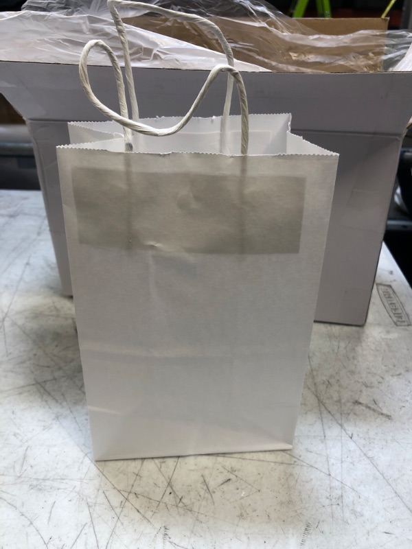 Photo 2 of 100 PCS PAPER BAGS WITH HANDLE 