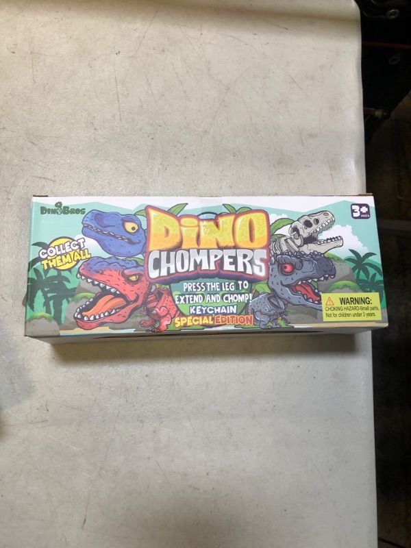 Photo 1 of DINOBROS Surprise Eggs with Dinosaur Toys Inside, 4 Plastic Egg Toys Filled with Dino Chomper Keychains Birthday Party Favors for Boys and Girls