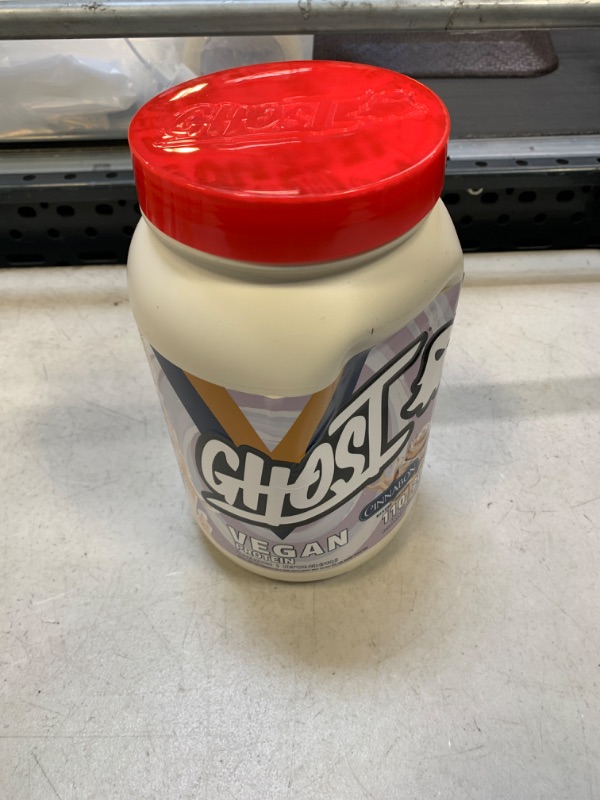 Photo 1 of EXP. 05/25 GHOST Vegan Protein Powder, Cinnabon - 2lb, 20g of Protein - Plant-Based Pea & Organic Pumpkin Protein - ­Post Workout & Nutrition Shakes, Smoothies, & Baking - Soy & Gluten-Free Cinnabon 2 Pound (Pack of 1)